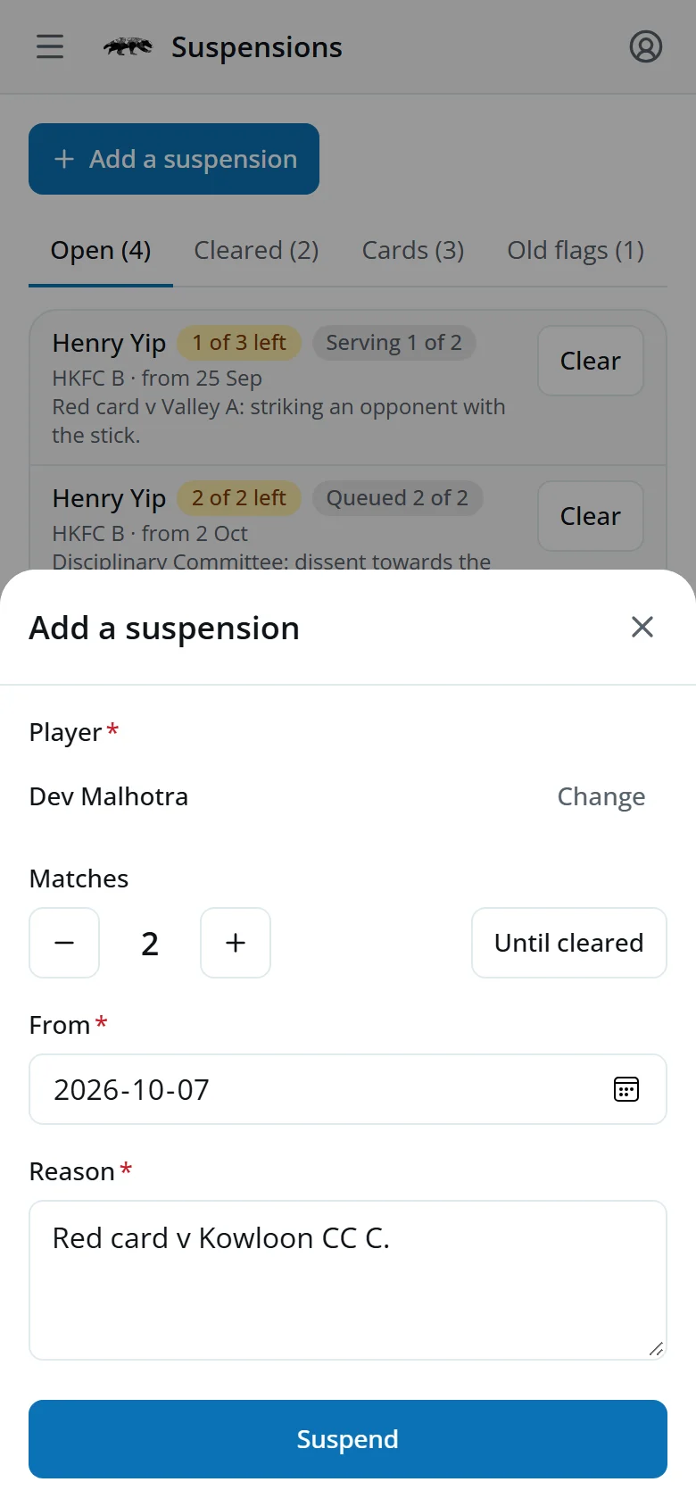 The Add a suspension sheet for Dev Malhotra: 2 matches from today, with the reason typed and the Suspend button
